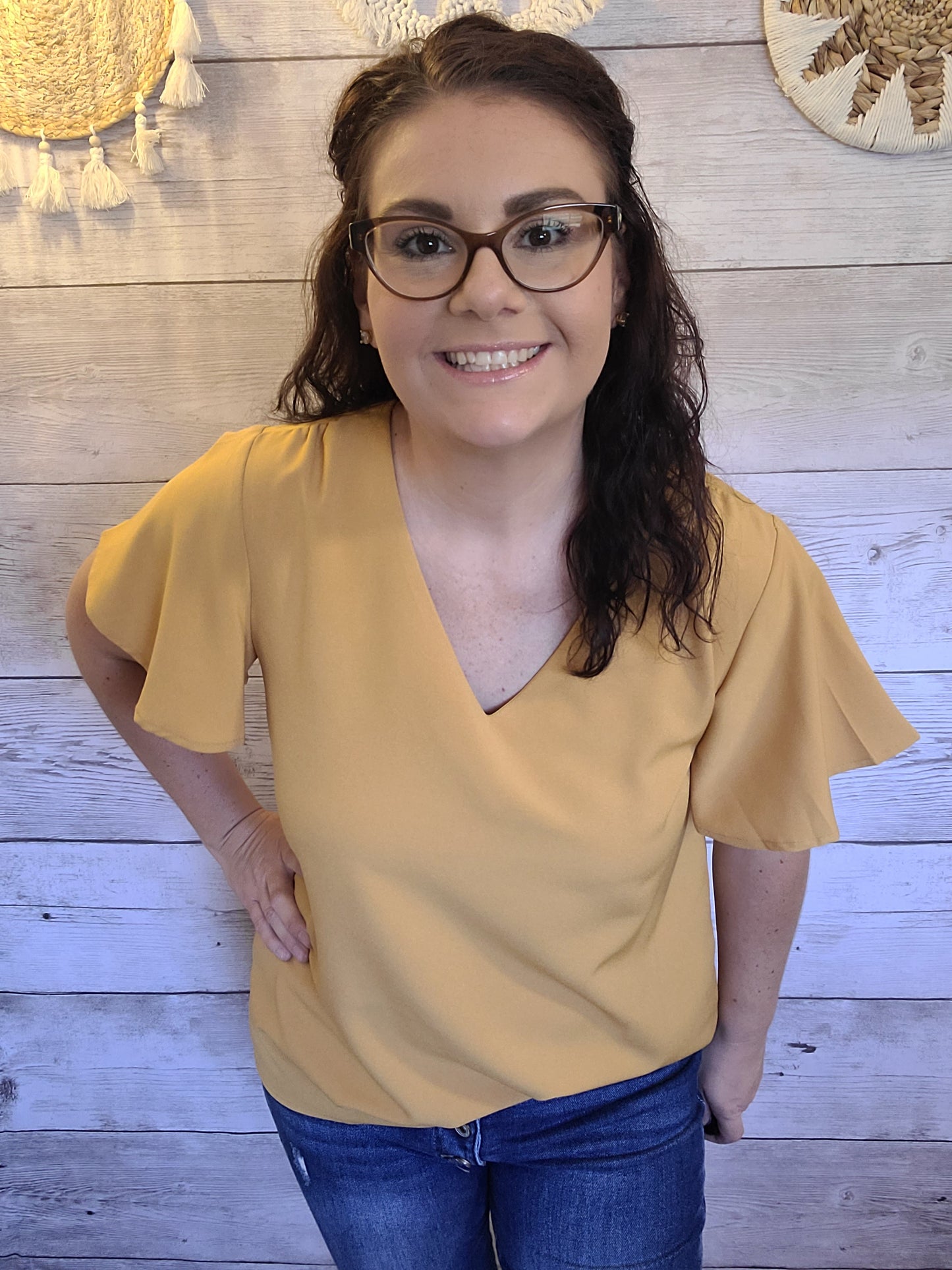 Harvest some style in this Dandelion Fields Golden Mustard Top! Featuring a woven flutter sleeve v-neck - it's the perfect outfit choice to spice up any look! Guaranteed to make you stand out like a ray of sunshine. Sizes small through x-large.