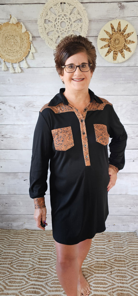 Giddy up!  This cute number features two functional leather designed pockets  that are a polyester material and long sleeves with the leather designed cuffs. The sleeves have the option of buttoning up to make it 3/4 sleeves. There is a leather design with buttons on the front of the dress and a black collar. Imagine yourself going to the rodeo, line dancing, or just hanging out with the girls. You choose how you want to have fun in this dress! Sizes small through x-large.