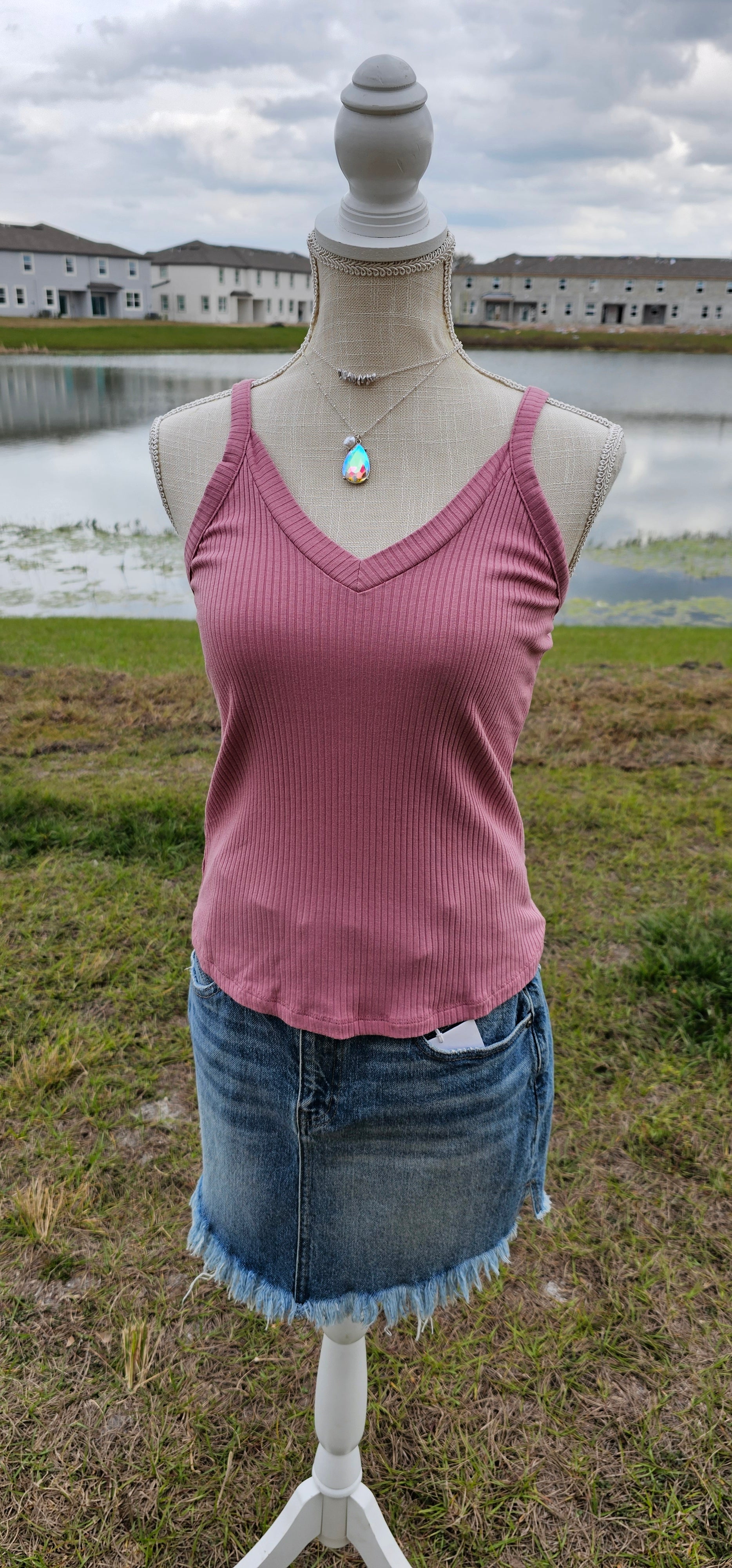 This “Basic Babe Tank Top: Dusty Rose” features a ribbed fabric, sleeveless tank top with v-neck and back. This is a great basic staple piece! Sizes small through x-large.