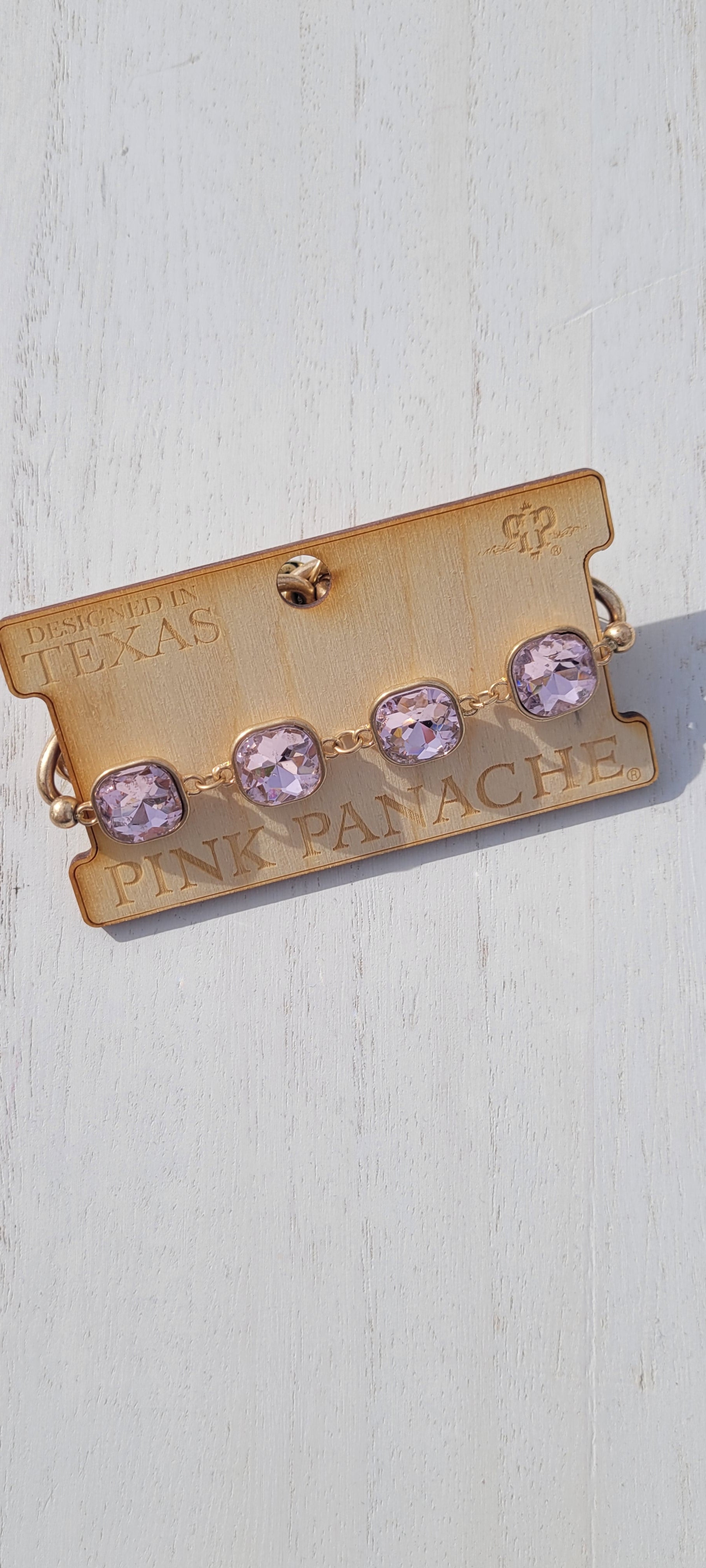 Pink Panache: Rose Pink Panache bracelet Color: Light pink square rhinestone and gold chain stretch bracelet Limited supply! Keywords: Bracelet, Jewelry