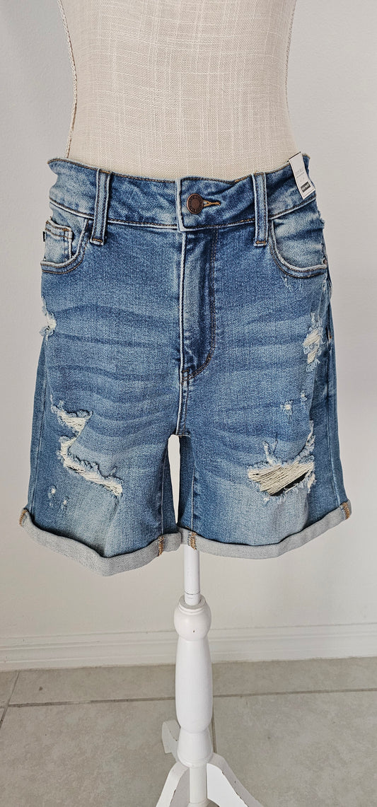 These high waist, mid- length, distressed shorts feature, cuffed leg, distressed look on front of shorts and the back pockets. These shorts are very stretchy for comfort.&nbsp; A great staple piece for your wardrobe.&nbsp; Go in style girl!&nbsp; You've go this!! Sizes small through x-large.