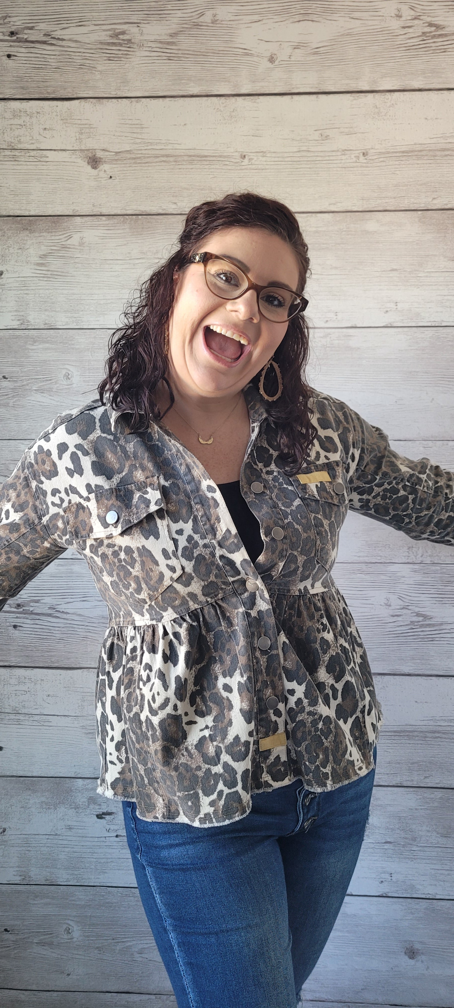 Go wild in our stunning "Felicia" jacket! This cozy-yet-chic piece is designed with a fierce leopard print, bust pockets, and metal buttons on the front closure to give your look some serious attitude. Button cuff long sleeve keeps you looking cool, while the peplum shaping gives you a flattering finish. Suit up and show the world who's boss! Sizes small through large.