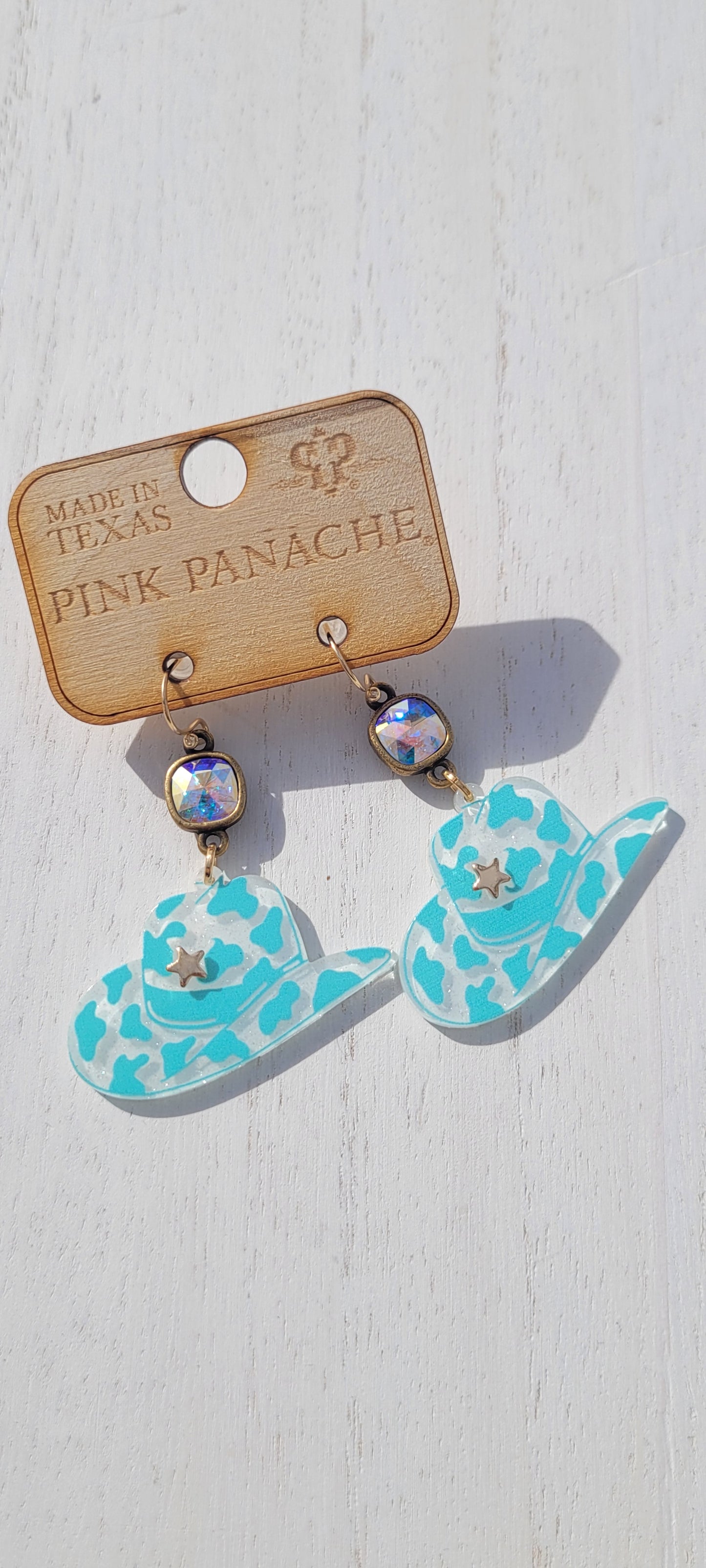 Pink Panache: Cowboy Hats Pink Panache Earrings Color: 8mm bronze/AB cushion cut connector on turquoise acrylic hat earring Limited supply! Keywords: Earrings, Jewelry