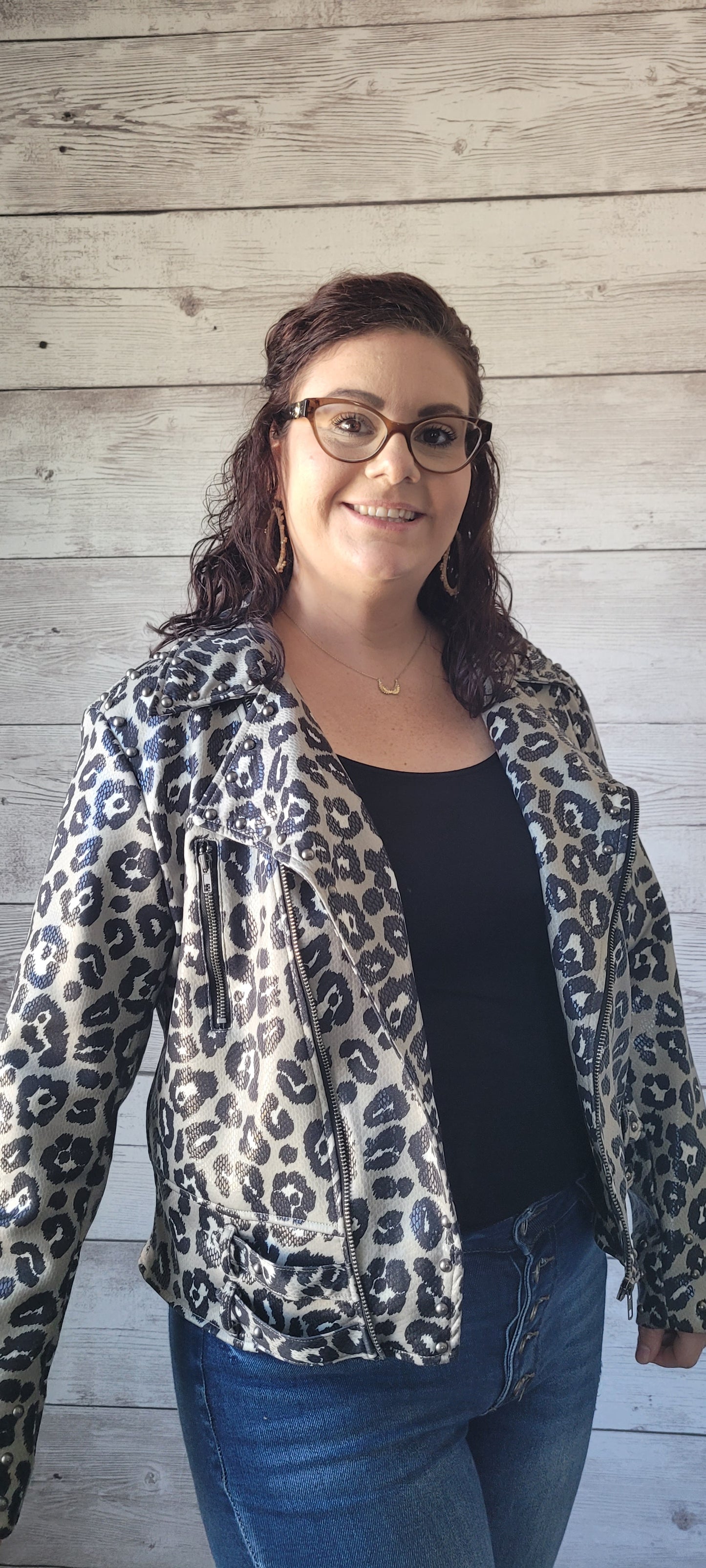This leopard jacket features two side zippers on front, the main zipper with folded over front, four belt loops for the little added feature, along with eyelet buttons for professional detailing. This adorable jacket is very soft and lightweight . Go ahead and take a walk on the wild side before it's gone. Sizes medium through x-large.