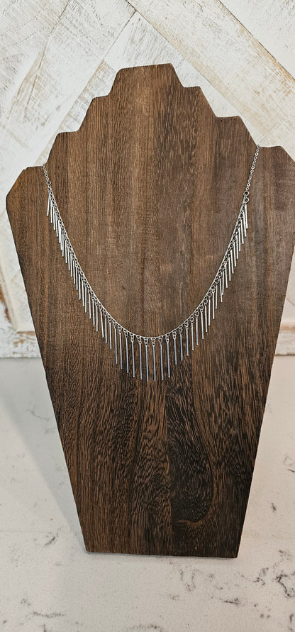 Approximate Length: Adjustable chain 16+2 inches Color: Silver link chain with silver fringe Limited supply!  