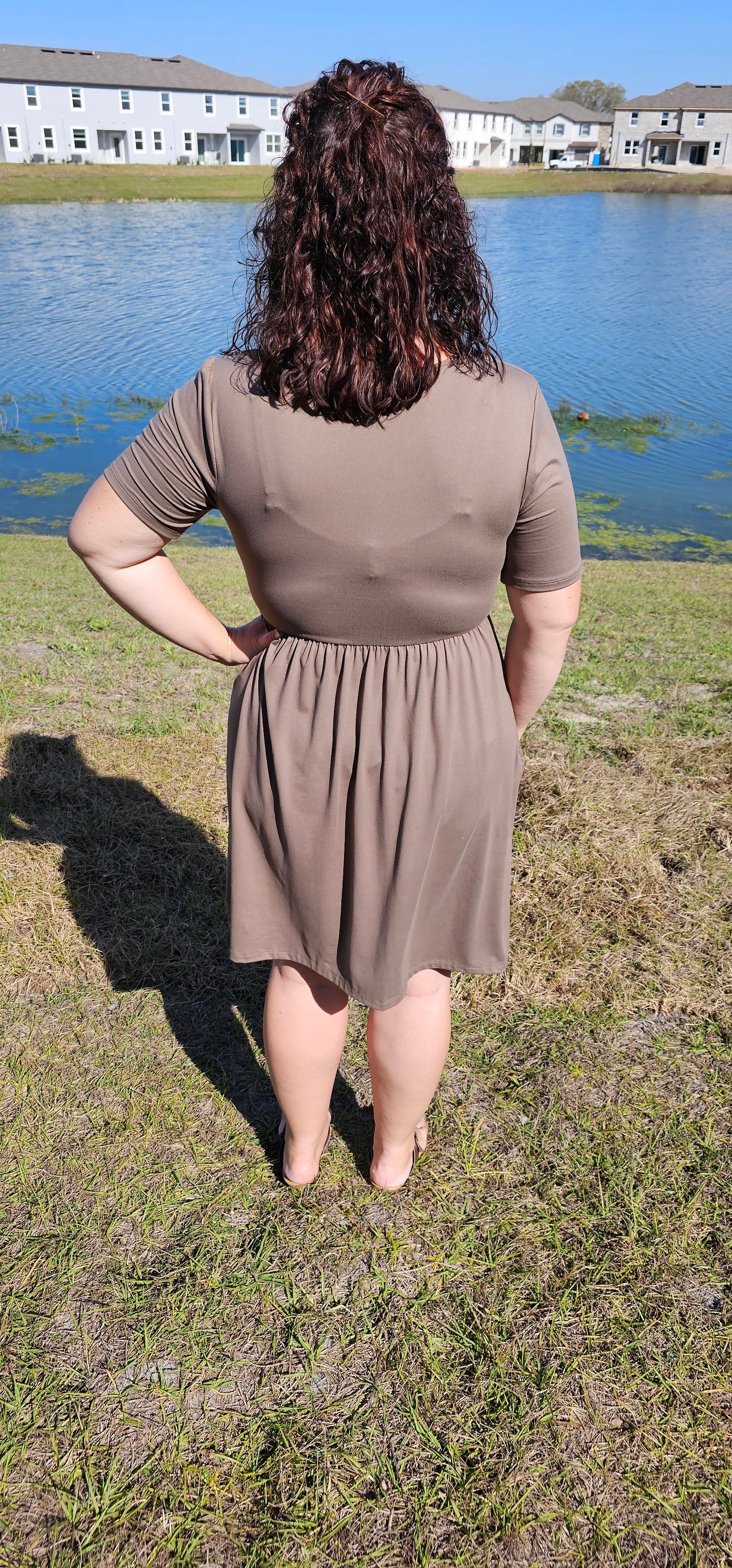 Stay cute, feminine, elegant and flattering at all times in this short sleeve mini dress. Featuring surplice neckline and pockets, this dress is ideal for all occasions. Sizes small through x-large.