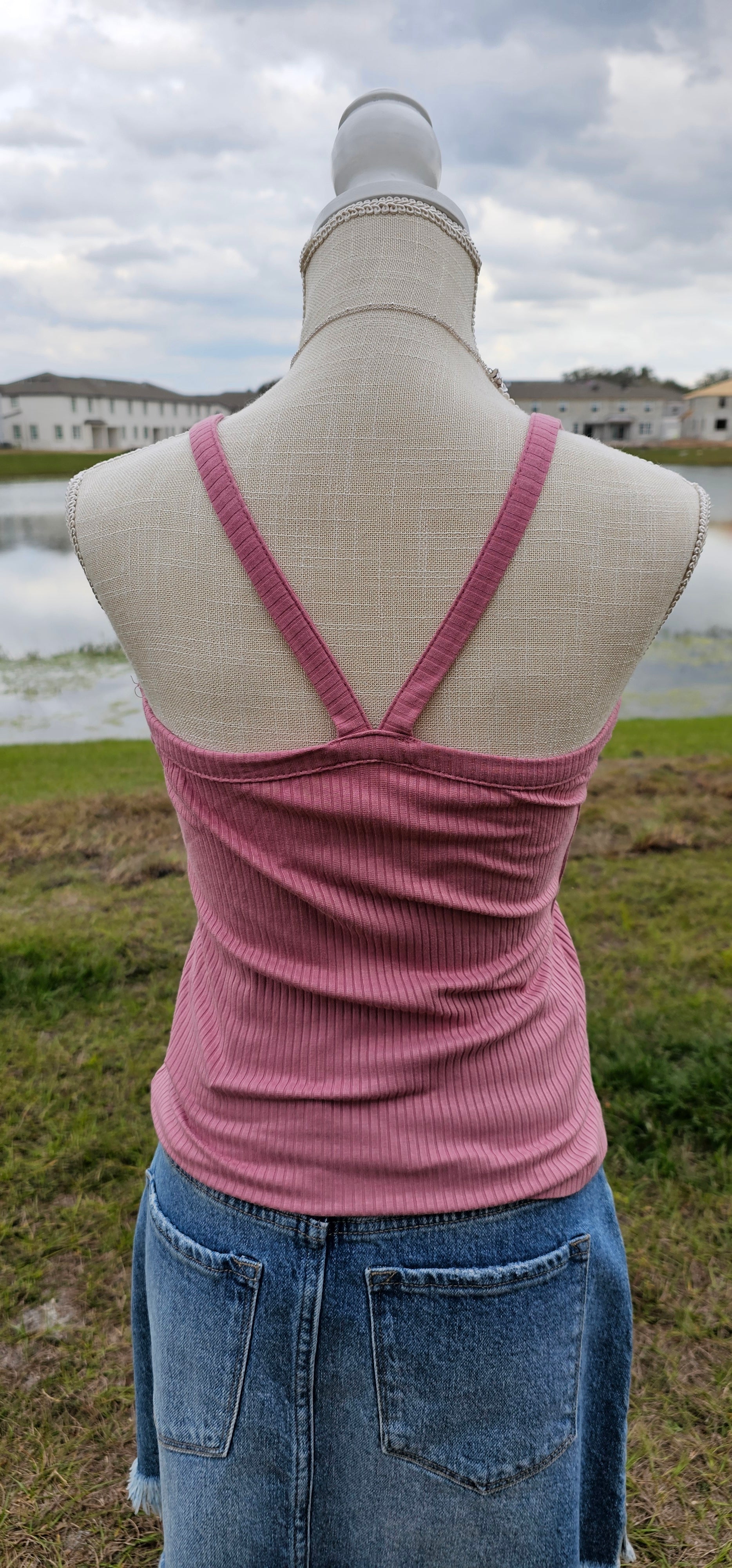 This “Basic Babe Tank Top: Dusty Rose” features a ribbed fabric, sleeveless tank top with v-neck and back. This is a great basic staple piece! Sizes small through x-large.This “Basic Babe Tank Top: Dusty Rose” features a ribbed fabric, sleeveless tank top with v-neck and back. This is a great basic staple piece! Sizes small through x-large.
