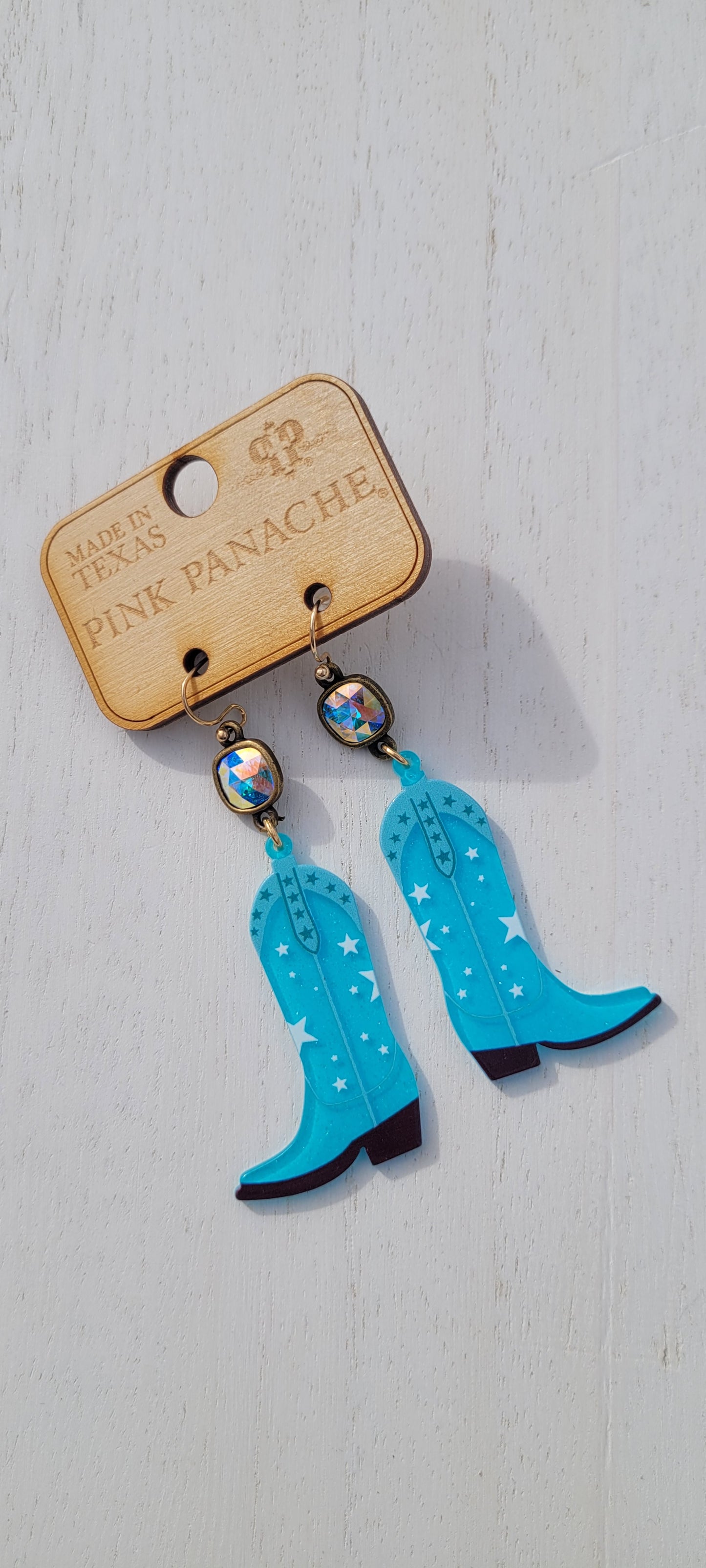 Pink Panache: Cowboy Boots Pink Panache Earrings Color: 8mm bronze/AB cushion cut connector on turquoise acrylic boot earring Limited supply! Keywords: Earrings, Jewelry
