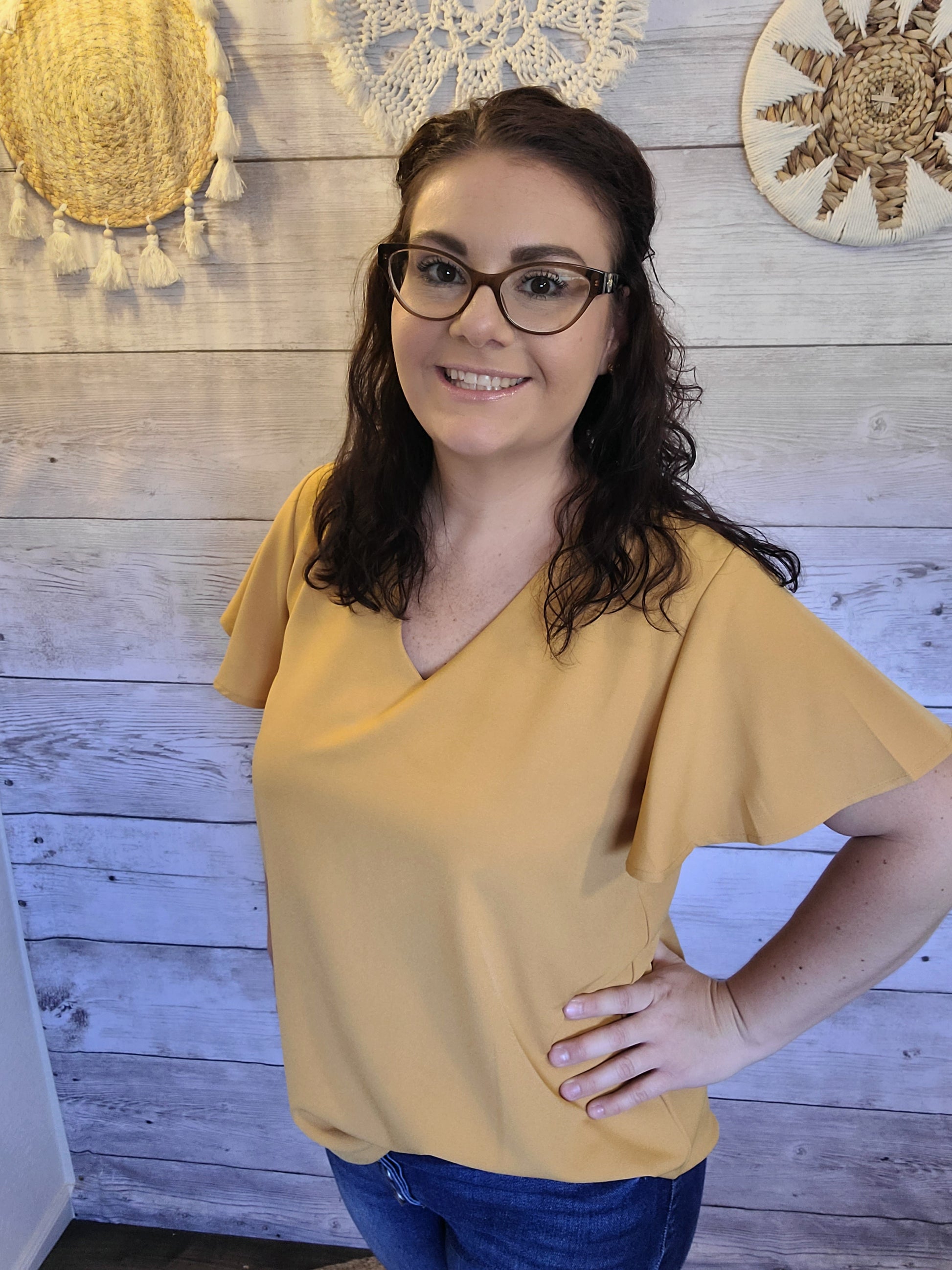 Harvest some style in this Dandelion Fields Golden Mustard Top! Featuring a woven flutter sleeve v-neck - it's the perfect outfit choice to spice up any look! Guaranteed to make you stand out like a ray of sunshine. Sizes small through x-large.