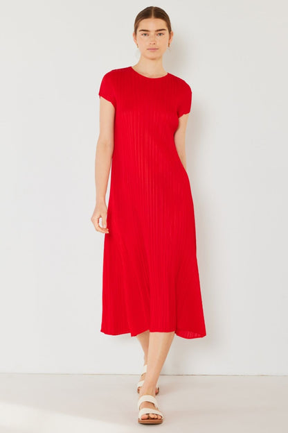The Pleated Cap Sleeve A-Line Dress is a timeless and elegant piece that exudes feminine charm. Featuring delicate pleats and cap sleeves, this dress offers a classic and flattering silhouette. 