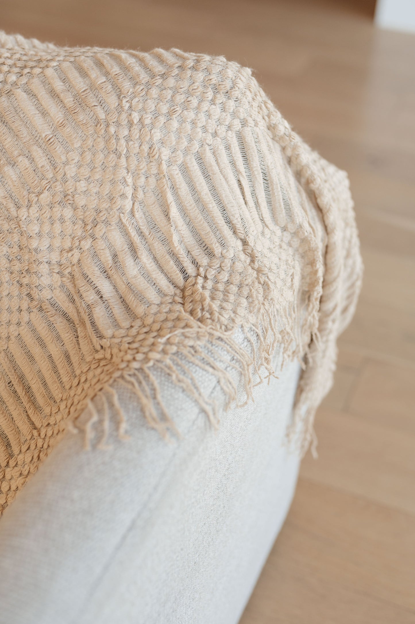 Step into a world of luxury with the Graham Throw by Cuddle Culture in Beige. Imagine wrapping yourself in a gentle embrace after a long day, enveloped in its soft, lightweight fibers. Crafted with care, the Graham blanket is the perfect companion for your cuddle sessions or chilly movie nights. 