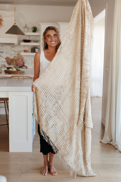 Step into a world of luxury with the Graham Throw by Cuddle Culture in Beige. Imagine wrapping yourself in a gentle embrace after a long day, enveloped in its soft, lightweight fibers. Crafted with care, the Graham blanket is the perfect companion for your cuddle sessions or chilly movie nights. 