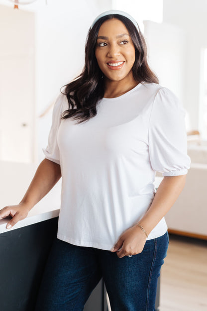 Look your best in the timelessly chic New Days Ahead White Blouse. Featuring a puff sleeve, a keyhole detail on the back, a classic white hue, and a comfortable jersey knit, this top is sure to be your new go-to for any occasion. S - 3X