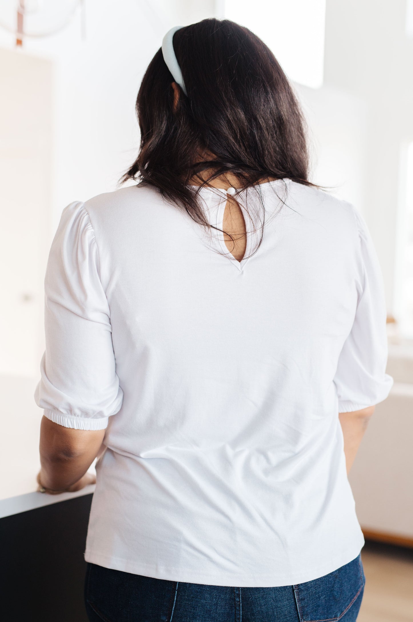 Look your best in the timelessly chic New Days Ahead White Blouse. Featuring a puff sleeve, a keyhole detail on the back, a classic white hue, and a comfortable jersey knit, this top is sure to be your new go-to for any occasion. S - 3X