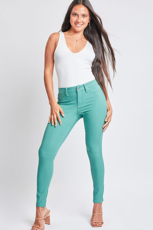 The Hyperstretch Mid-Rise Skinny Pants are a sleek and versatile wardrobe essential that combines style with comfort. Designed with a mid-rise waist and skinny leg silhouette, these pants offer a flattering and modern look. Crafted from hyperstretch fabric, they provide a flexible and comfortable fit that moves with your body. S - 3X