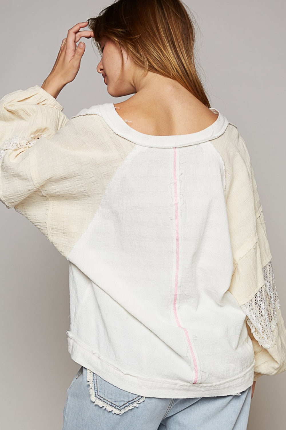 This Balloon Long Raglan Sleeve Crochet Patch Top is a trendy and stylish piece for your wardrobe. The balloon sleeves and raglan design give it a unique and modern look. The crochet patch detail adds a touch of charm and texture to the top. S - L