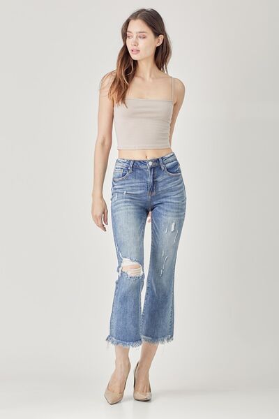 These High Waist Distressed Cropped Bootcut Jeans are a must-have for any fashion enthusiast. The high waist design provides a flattering and slimming look, while the distressed detailing adds a touch of edginess and a worn-in vibe.  0 - 15
