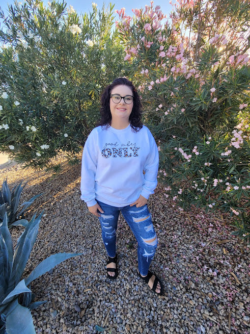 Imagine yourself in this comfy white long sleeve sweatshirt.  This sweatshirt features leopard and black print lettering.  This is a great staple piece. We all need a cute comfy sweatshirt to throw on to run errands, sit by the fire, hang out with friends, or just to be comfy in.