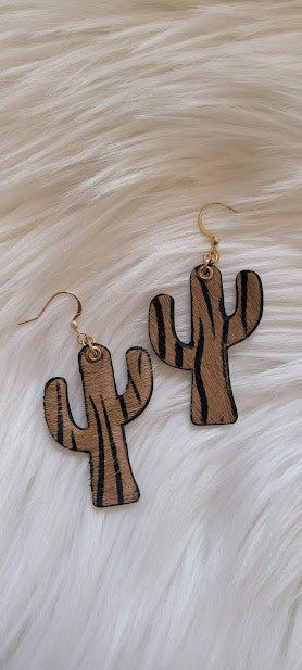 Zebra Cactus Earrings  Cactus design Genuine leather Brown zebra print Gold fish hook Gold eyelet Rubber earring back Whether you want to be on the wild side or classy this earring set it will add a fun touch to your outfit