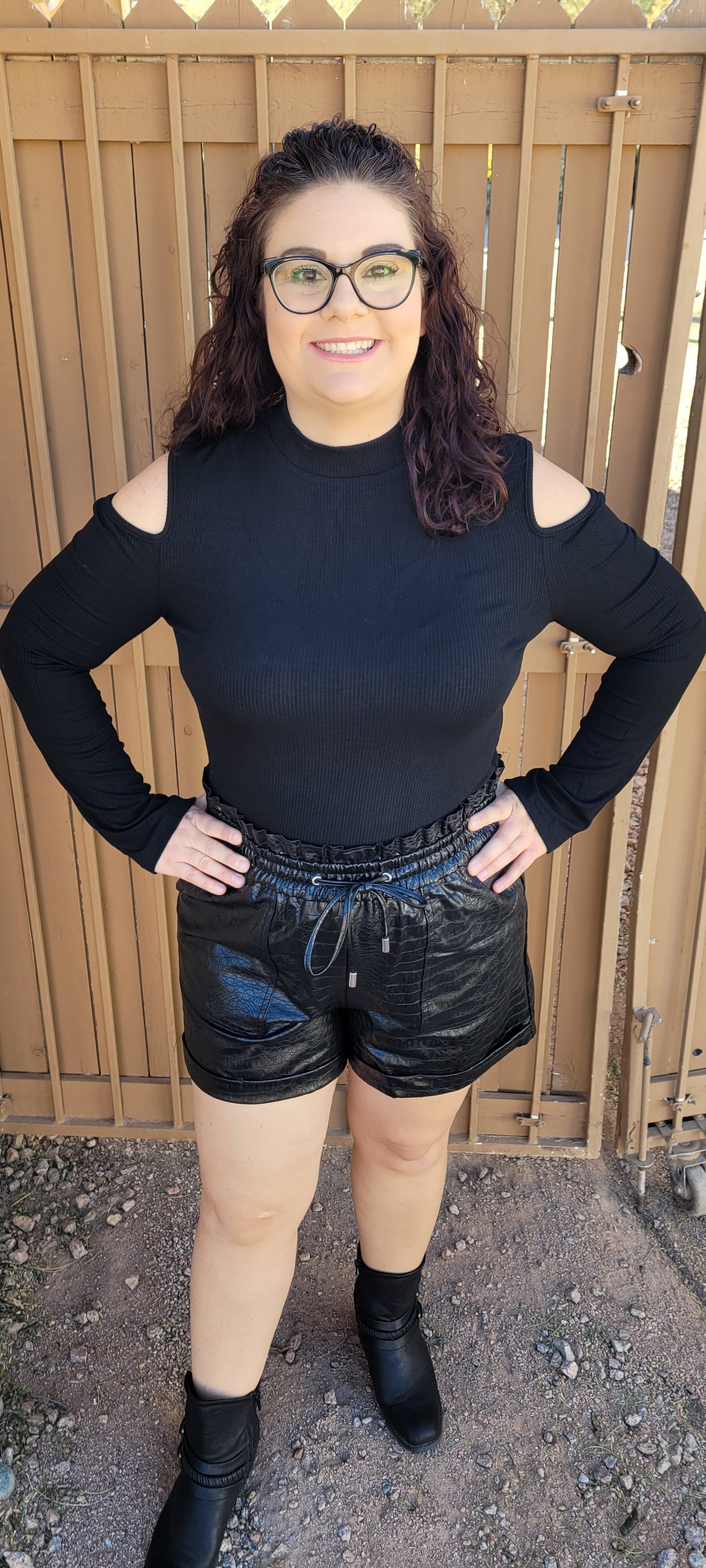 Imagine yourself in this cute staple piece.  This top offers cold shoulders on both sides, ribbed material, and is light weight.  Go ahead and be a little wild with this cutie!  Show off your stuff! Sizes small through x-large.