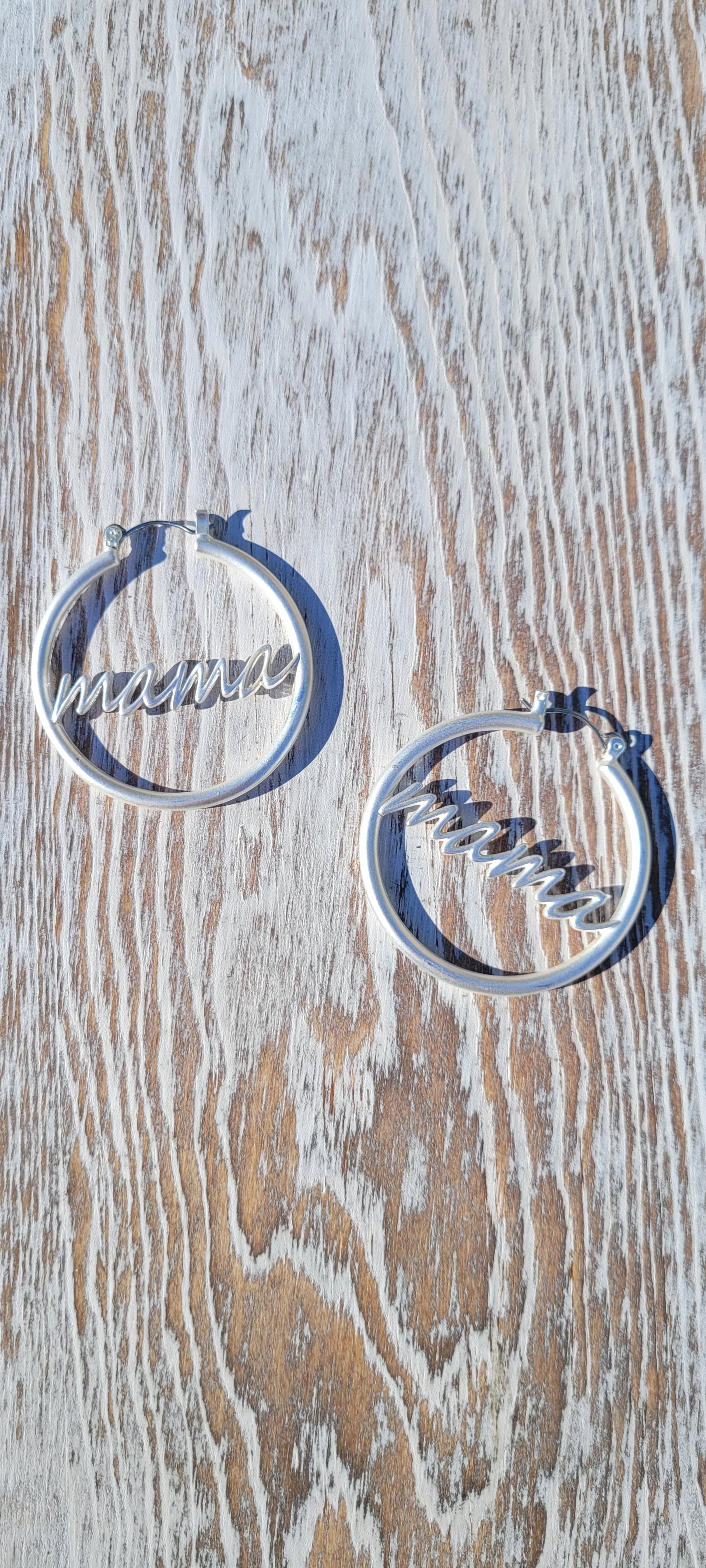Silver hoops “Mama” wording Self locking earring back Diameter 1.625” Whether you want to be on the wild side or classy this earring set it will add a fun touch to your outfit