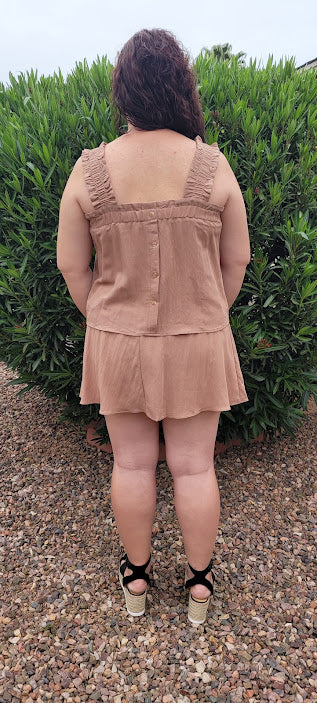 Let’s go exploring! “Lost In The Desert Skirt” features a cinched elastic waistband with ruffled trim, smocked skirt, and  lined with shorts. This skirt pairs perfectly with “Lost In The Desert Top”. It is lightweight and breathable. Imagine exploring the mountains out west or dipping your toes in the Gulf of Mexico! This duo makes a perfect vacation outfit! Sizes small through large.