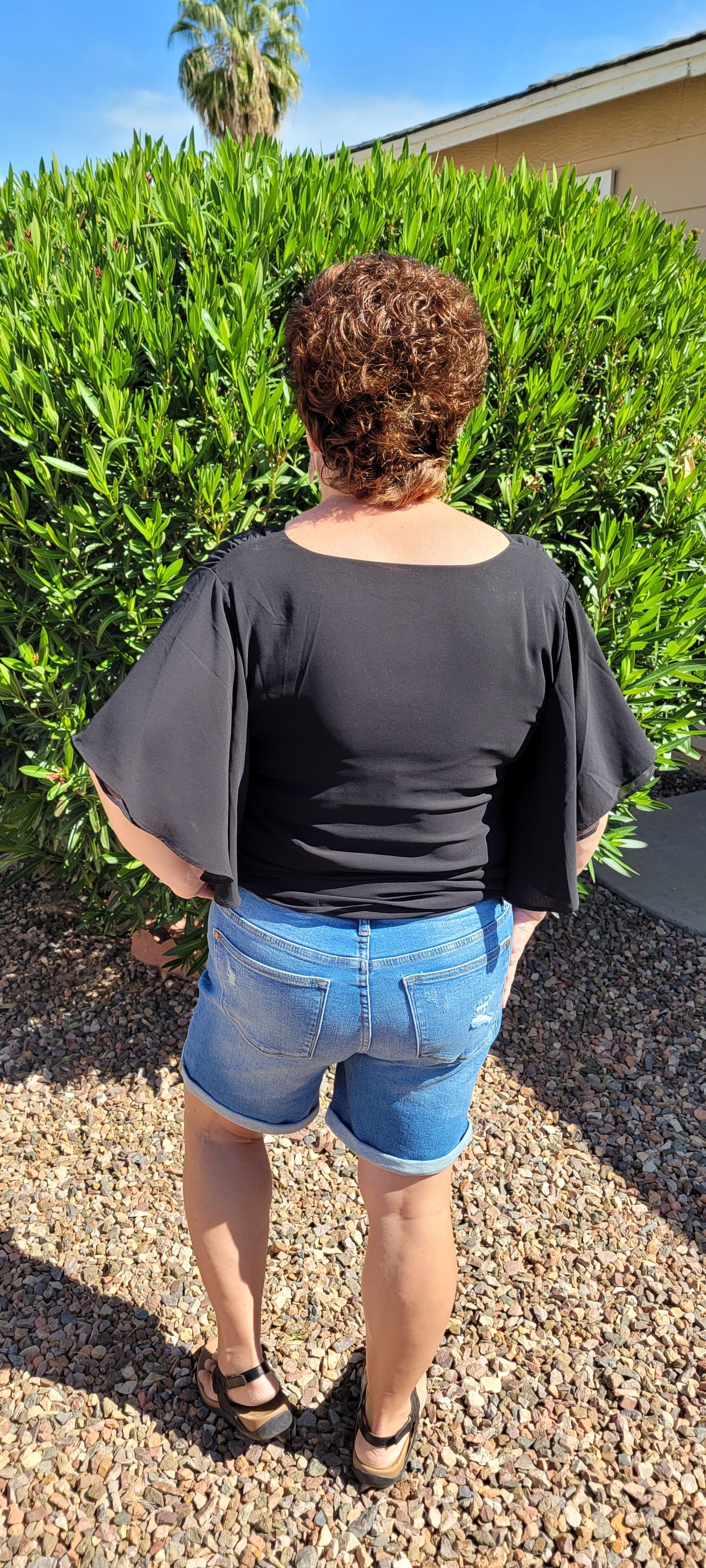 These high waisted, mid- length, distressed shorts feature, cuffed leg, distressed look on front of shorts and the back pockets. These shorts are very stretchy for comfort.  A great staple piece for your wardrobe.  Go in style girl!  You've go this!!