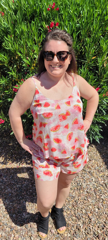 “One In A Melon Shorts” features an elastic waistband with drawstring, two functional pockets, and has a lining. The shorts are white with pink tie dye and adorable little watermelons. This pair of shorts pairs perfectly with “One In A Melon Top”. It is lightweight and breathable. This duo makes a perfect vacation outfit! Sizes small through large.