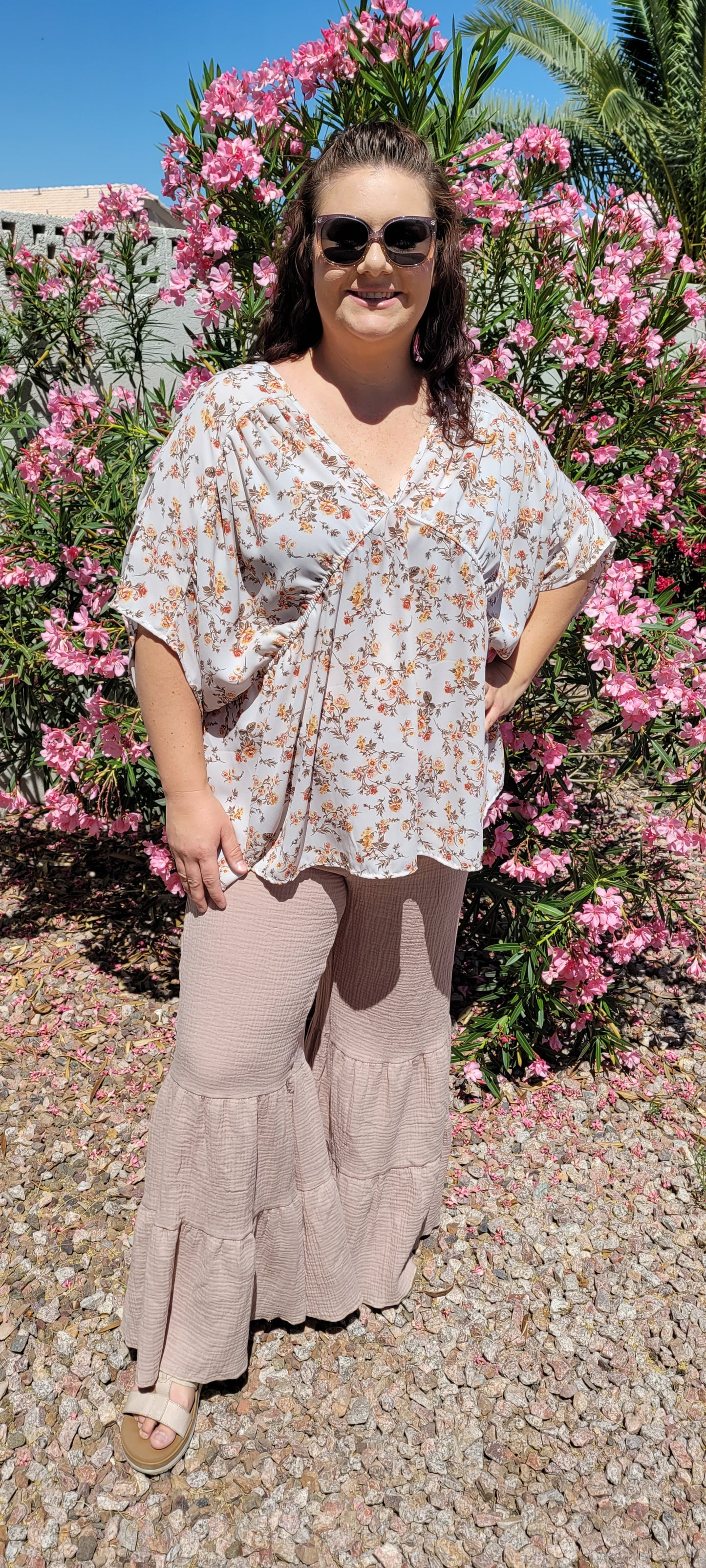 “Sands Of Time”  are a taupe double tiered wide leg, cotton gauze pants. The pants feature a high waisted elastic waistband, wide leg flare. These pants can be dressed up or casual. They are perfect for vacation, as they are light and breezy. Sizes small through large.