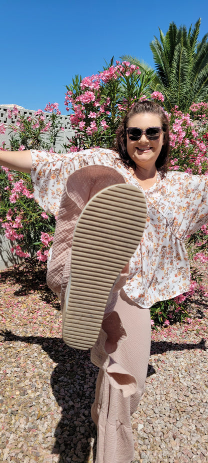 “Sands Of Time”  are a taupe double tiered wide leg, cotton gauze pants. The pants feature a high waisted elastic waistband, wide leg flare. These pants can be dressed up or casual. They are perfect for vacation, as they are light and breezy. Sizes small through large.