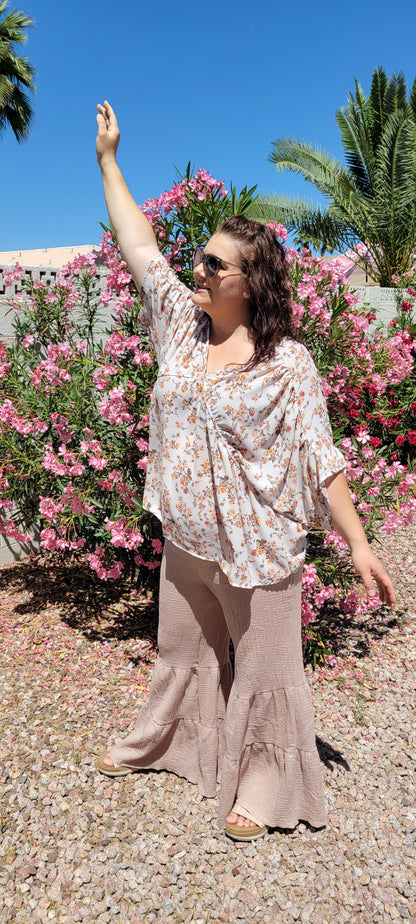 “Sands Of Time”  are a taupe double tiered wide leg, cotton gauze pants. The pants feature a high waisted elastic waistband, wide leg flare. These pants can be dressed up or casual. They are perfect for vacation, as they are light and breezy. Sizes small through large.