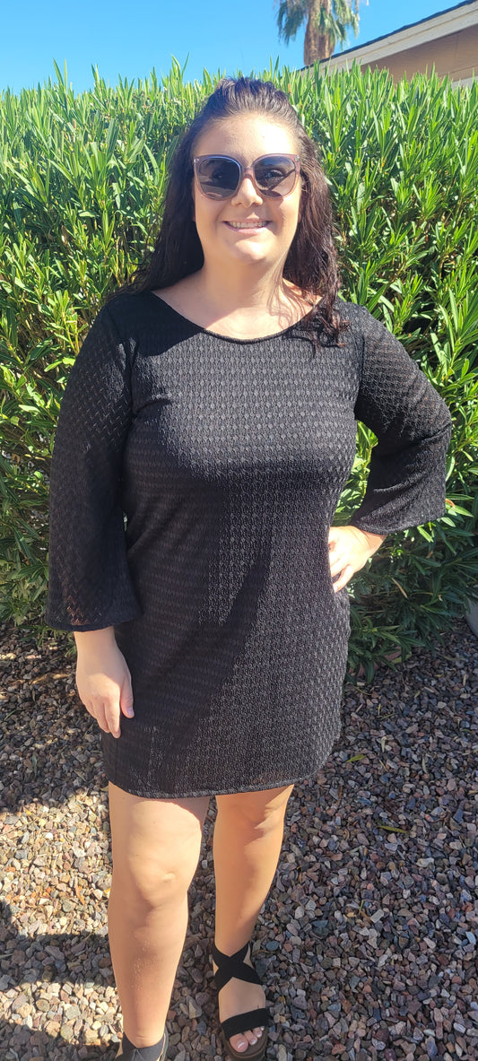 “Sassy In Black” is a classy black dress that is a staple piece for your wardrobe! This dress features a lace detail, a boat neck and plunging scoop neckline in back, bell sleeves, there is a lining in the body of the dress not in sleeves. This dress comes above the knees. Perfect for attending that outdoor wedding or a sunset cruise dinner. Sizes small through large.