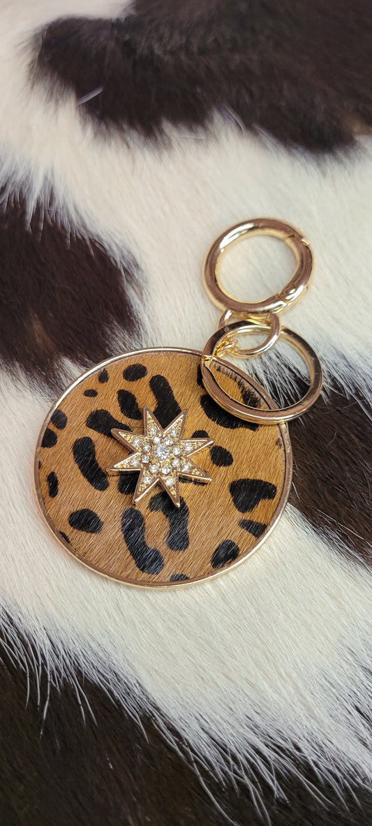 3.5 inch paved starburst keychain Real calf hair and leather, cheetah print Gold color chain and key ring These key chains will not last long