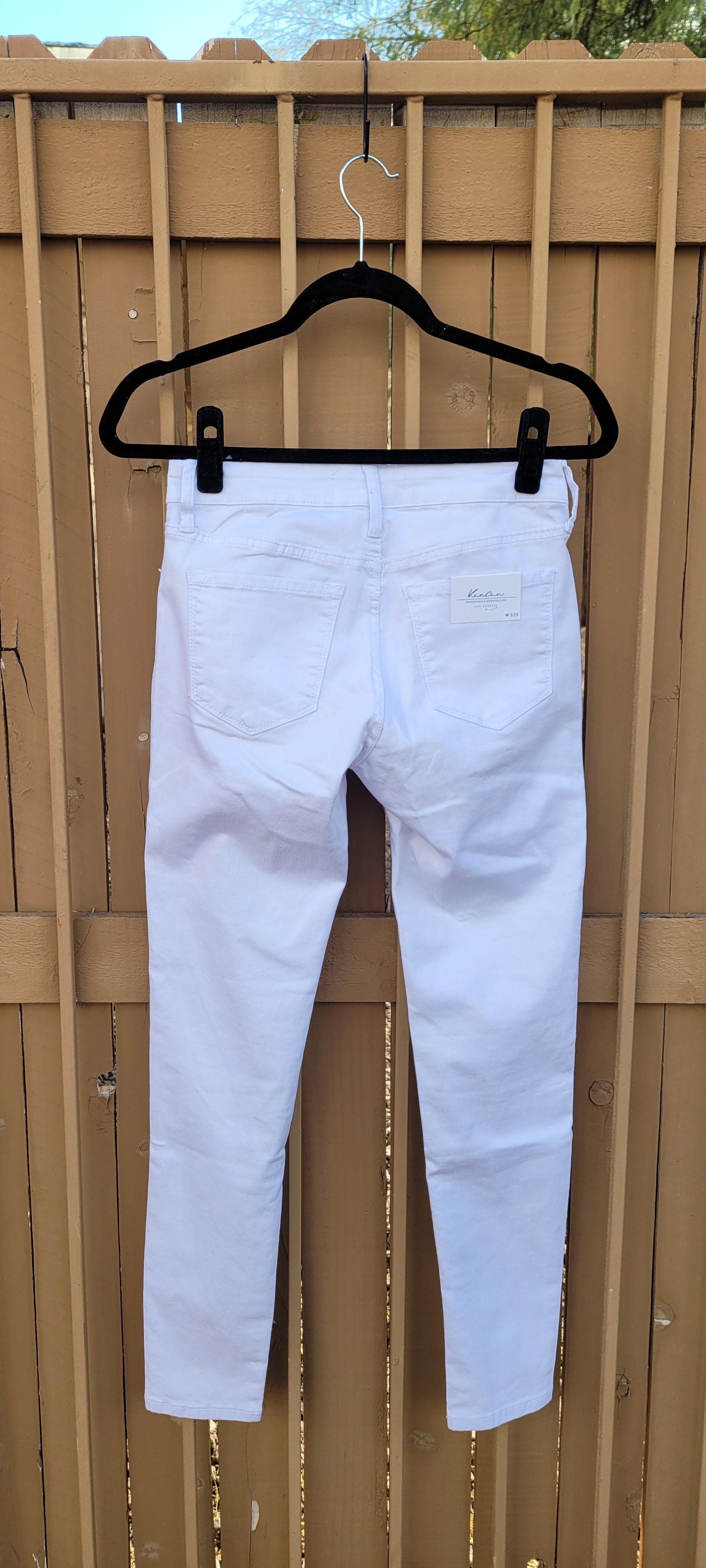 These cute white mid rise, ankle skinny jeans are nice and stretchy.  Please refer to photo below for stretch level. Great for everyday wear.  You can dress these jeans up or wear them as a casual piece.  You choose how you want to make a statement. Sizes 3/25, 5/26, 9/28, 11/29