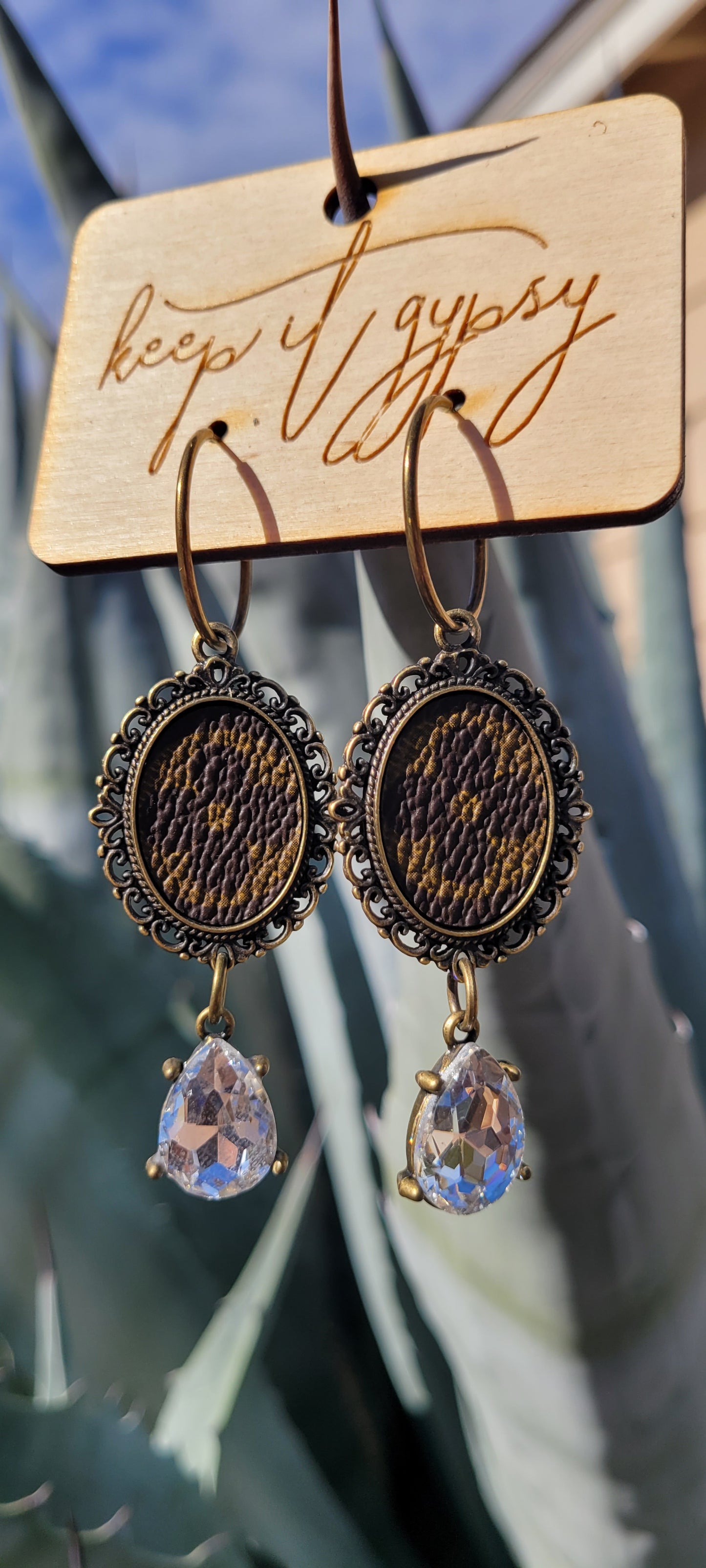 Upcycled Earrings Brown with Clear Crystal  Limited supply!    Due to the nature of leather/suede, small variances of color in the skin may occur, this is in no way considered a defect. These are inherent characteristics of leather/suede and will enhance the individual look of your garment.