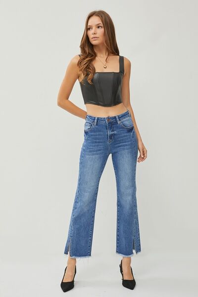 These High Waist Raw Hem Slit Straight Jeans are the ultimate combination of comfort and style. With their high waist design, they provide a flattering and slimming fit. The raw hem and slit details add a touch of edginess and give these jeans a trendy and unique look. Made from high-quality denim, they are durable and built to last.