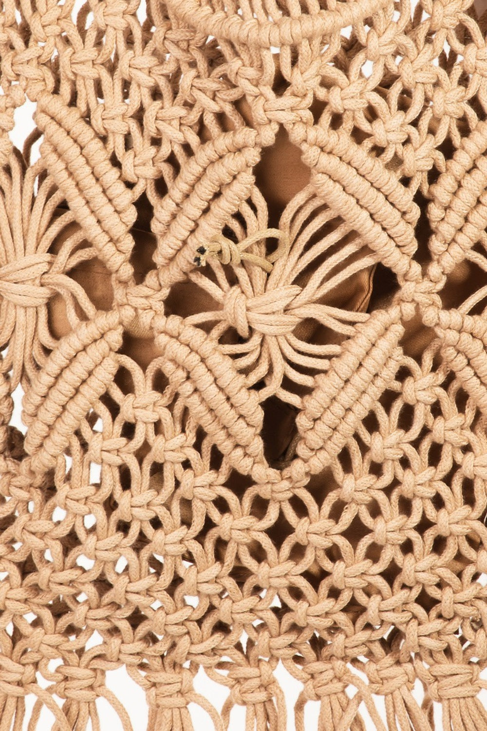 Woven Handbag with Tassel is a chic and stylish accessory that exudes a bohemian vibe with its woven design and playful tassel accent. The handbag features intricate weaving techniques that create a unique and eye-catching texture.