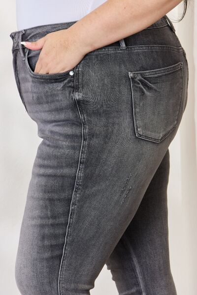 These jeans boast a high-waisted design that offers a flattering silhouette while providing remarkable tummy control. The release hem detail adds an edgy touch, elevating these skinnies from classic to chic. Made from premium stretch fabric, they ensure a comfortable fit while maintaining their shape wear after wear. Sizes 0/24 to 24W.