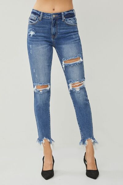 These Distressed Frayed Hem Slim Jeans are a must-have for anyone who loves a touch of edginess in their wardrobe. The distressed detailing adds a cool and rebellious vibe to these jeans, giving them a unique and trendy look. The slim fit design hugs your curves in all the right places, creating a flattering and stylish silhouette.