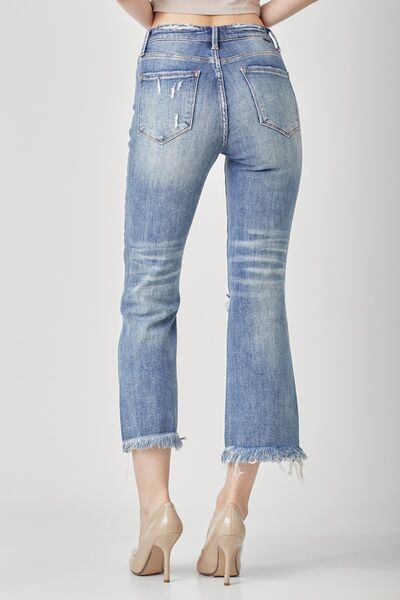 These High Waist Distressed Cropped Bootcut Jeans are a must-have for any fashion enthusiast. The high waist design provides a flattering and slimming look, while the distressed detailing adds a touch of edginess and a worn-in vibe.  0 - 15