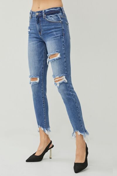 These Distressed Frayed Hem Slim Jeans are a must-have for anyone who loves a touch of edginess in their wardrobe. The distressed detailing adds a cool and rebellious vibe to these jeans, giving them a unique and trendy look. The slim fit design hugs your curves in all the right places, creating a flattering and stylish silhouette.