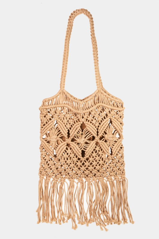 Woven Handbag with Tassel is a chic and stylish accessory that exudes a bohemian vibe with its woven design and playful tassel accent. The handbag features intricate weaving techniques that create a unique and eye-catching texture.