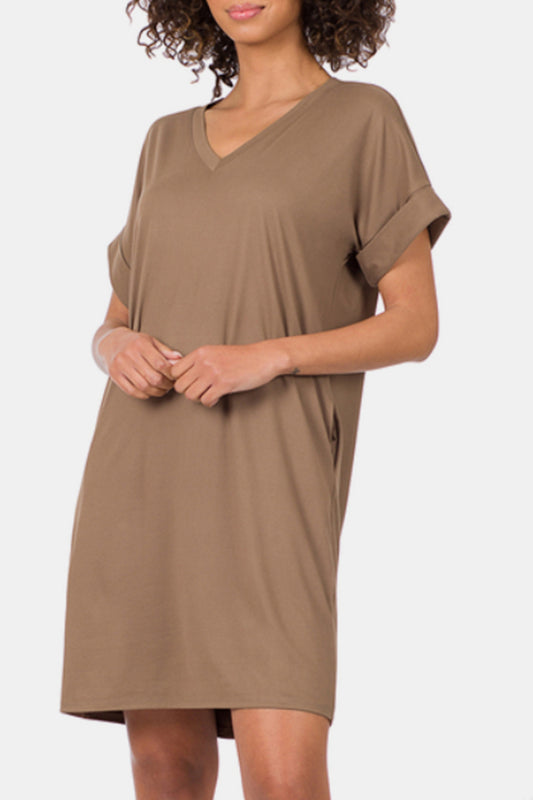 The rolled short sleeve V-neck dress is a versatile and stylish addition to your wardrobe. The V-neckline adds a touch of femininity and elegance, while the rolled short sleeves provide a casual and relaxed vibe.  S - XL