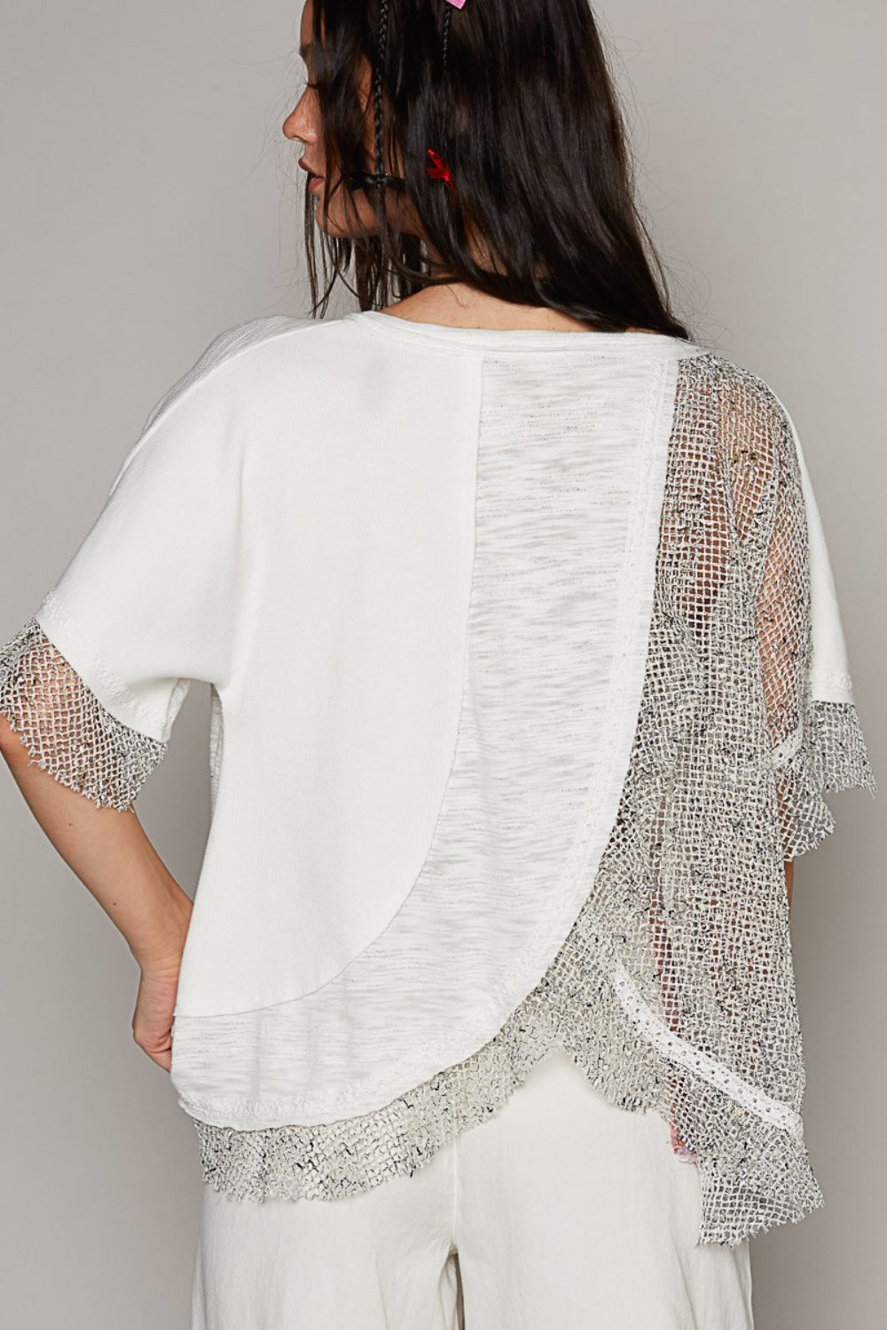 The Openwork V-Neck Half Sleeve Top is a chic piece that adds a touch of elegance to any outfit. The intricate openwork detailing on the sleeves creates a sophisticated and feminine look.  S - L