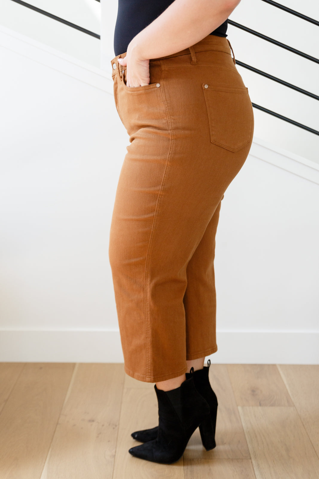 Discover your new favorite jeans with Briar's High Rise Control Top Wide Leg Crop Jeans from Judy Blue. Our triple threat of design, fit, and color come together for maximum style, comfort, and chicness. Features include high rise, tummy control tech, and a wide leg crop in a warm rich garment-dyed camel. Complete with coordinating hardware and you're ready to look and feel amazing!