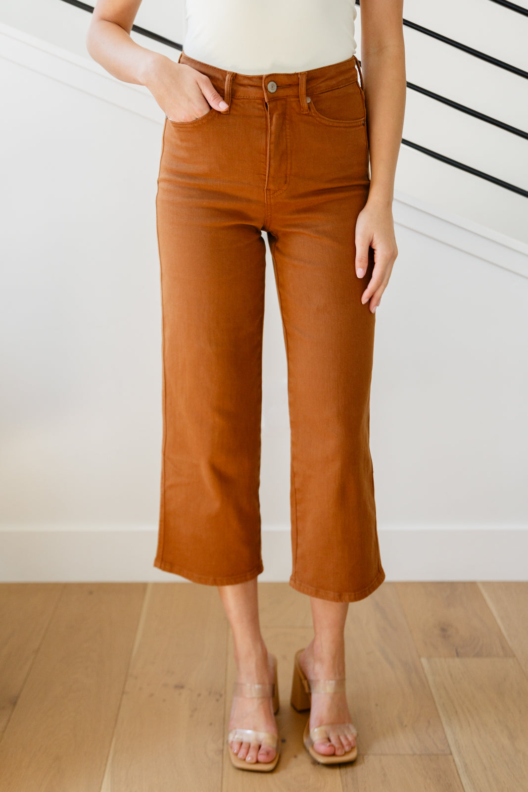 Discover your new favorite jeans with Briar's High Rise Control Top Wide Leg Crop Jeans from Judy Blue. Our triple threat of design, fit, and color come together for maximum style, comfort, and chicness. Features include high rise, tummy control tech, and a wide leg crop in a warm rich garment-dyed camel. Complete with coordinating hardware and you're ready to look and feel amazing! 0 - 24W