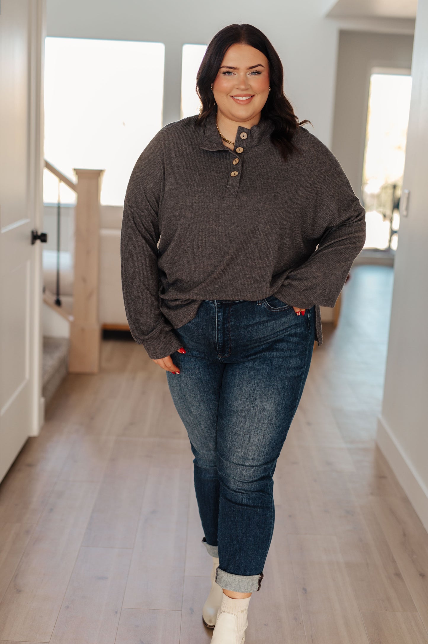 Feel warmth and comfort with this Cozy All Over Henley Top! It features a mock neckline, functional buttons, brushed ribbed knit and dropped shoulder - creating a timeless wardrobe staple. Soft to the touch and perfect for any occasion, this top will be a warm hug all year round! S - 3X