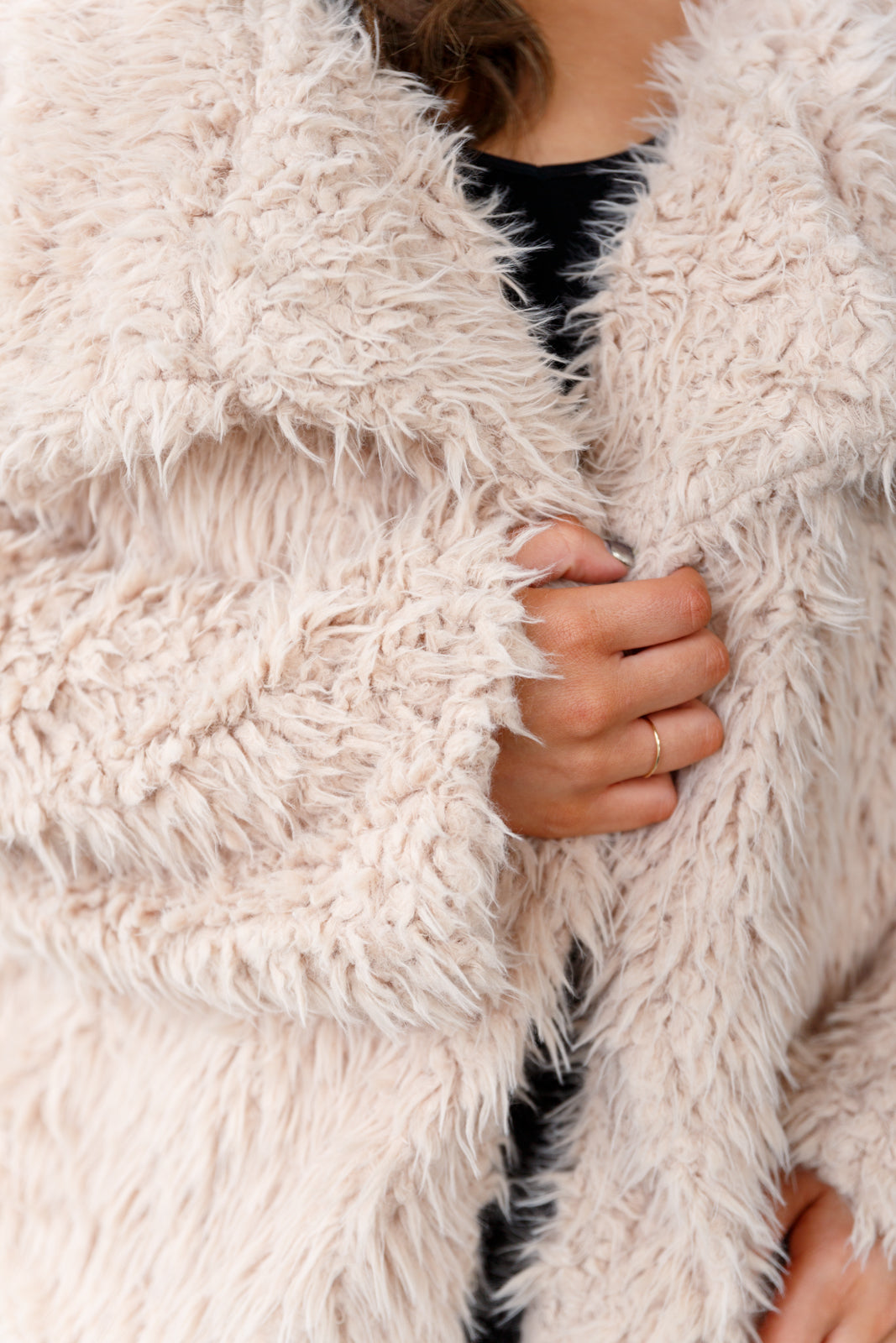 This Disco Queen Faux Fur Coat will make you shine on the dance floor! Its shaggy faux lambs fur, pockets, open front, and exaggerated fold over collar are sure to turn heads. This coat will keep you warm and stylish all night long! S - 3X