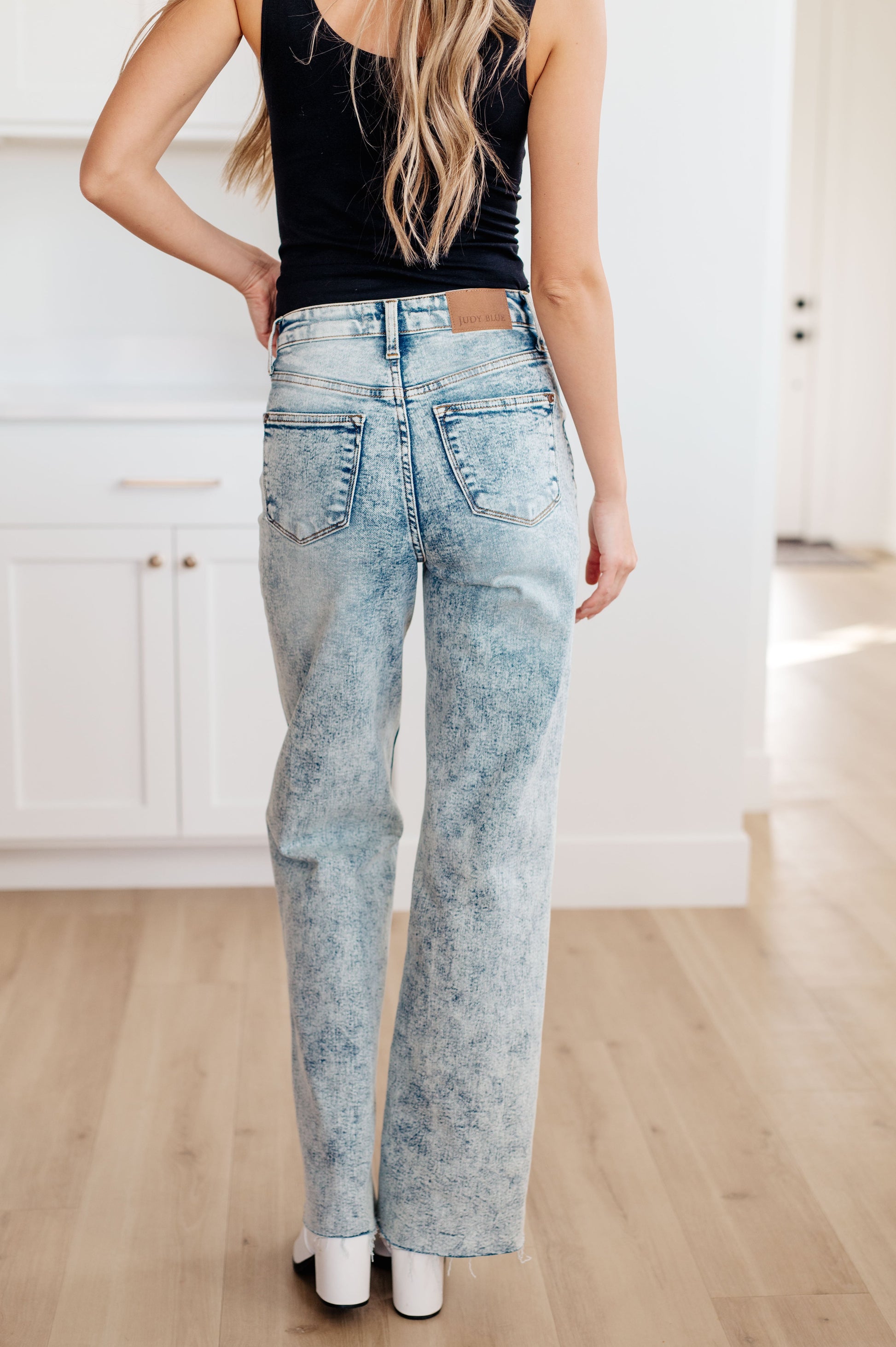 Get ready to elevate your denim game with our Dory High Waist Mineral Wash Raw Hem Wide Leg Jeans from Judy Blue. Designed for comfort with 4-way stretch and a high rise waist, these jeans will give you the perfect fit every time. The mineral wash and raw hem add a touch of style for a versatile and on-trend look 0 -24W