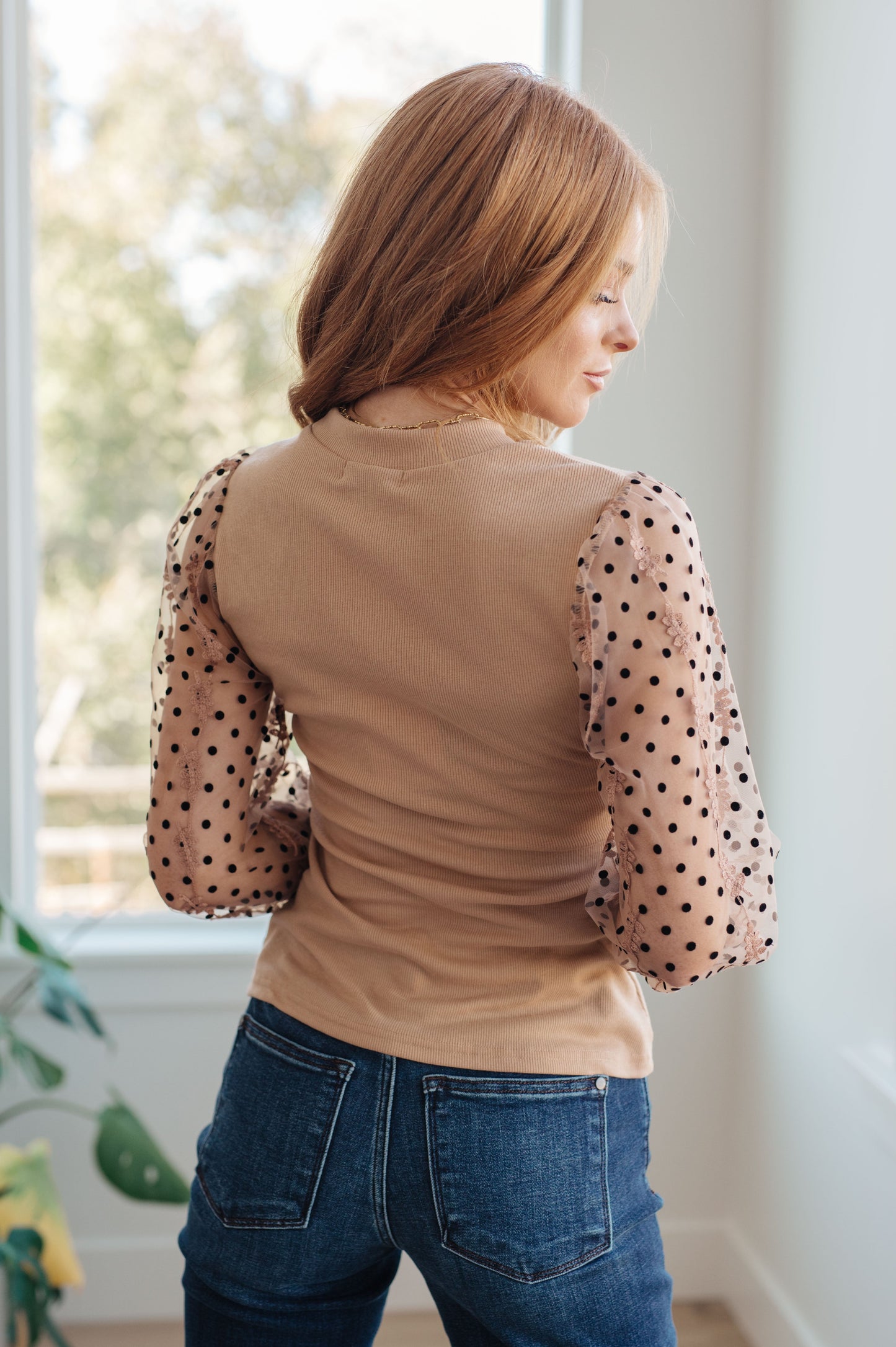 Be fashion-forward in our exclusive Dots on My Sleeves Blouse! This slim-fit top features sheer sleeves embellished with velvet polka dots and an embroidered floral pattern. The round neckline gives the perfect finishing touch to this unique style. Stay chic and look fabulous in this essential blouse! S - 3X